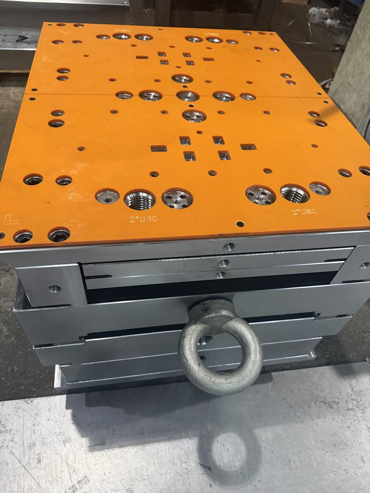 Finished mold base with orange side plates, machined by Hsingchao Mould in Dongguan